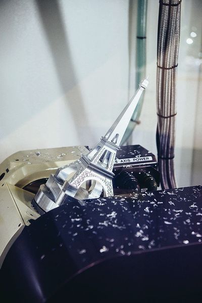 A vertical machining center from Sweden and the French landmark: YCM's NSV160A mills the Eiffel Tower from a metal block in Hall 27. (Roman Pawlowski)