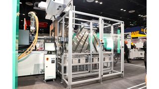 Complete solution: The production cell based around an electric Allrounder 720 E Golden Electric includes a system that ejects the 24 razor covers into boxes, clustered by cavity. (Source: Arburg)