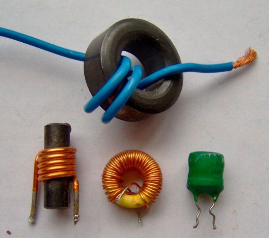 This image shows the inductor symbol.  (Source:  Electronic component inductors /Miguel / CC BY-SA 3.0)