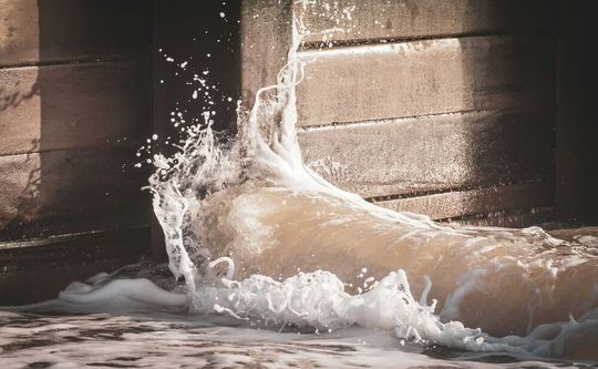 Sewage overflows occur when untreated sewage enters homes or the environment through broken or clogged pipes, or when the sewage system is overwhelmed.(Source:  free licensed / Unsplash)