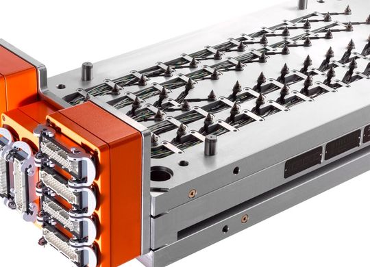 The H4400/… hot runner system from Hasco hot runner combines melt flow management, control technology and a ready-to-install plate assembly for efficient injection moulding applications.(Source:  Hasco)