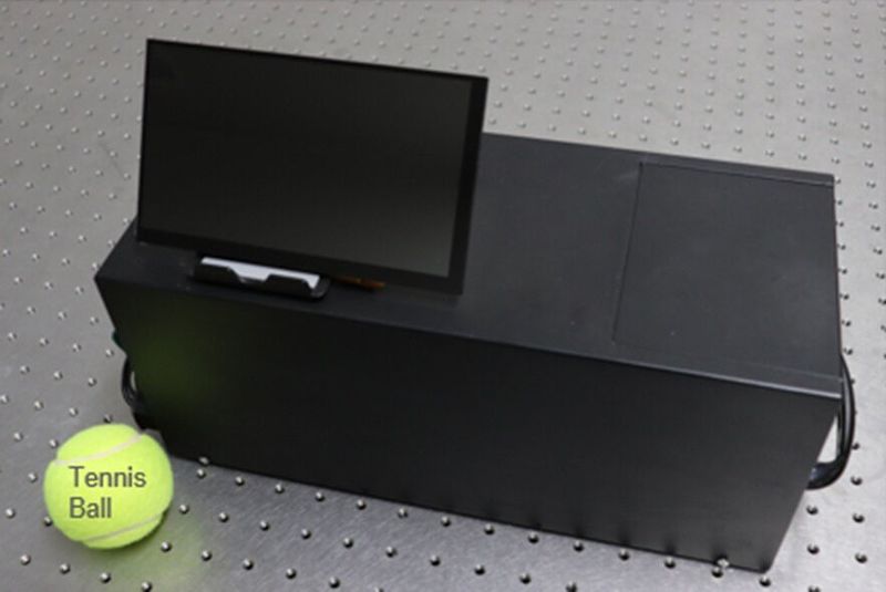 The newly developed portable fluorescence polarization analyzer (35 cm wide, 15 cm high, 15 cm long, and weighs 5.5 kg) combines a microfluidic device, an optical system, a liquid crystal, and an image sensor, enabling the rapid analysis of multiple samples. (Nishiyama K. et al., Sensors and Actuators B: Chemical. April 21, 2020)