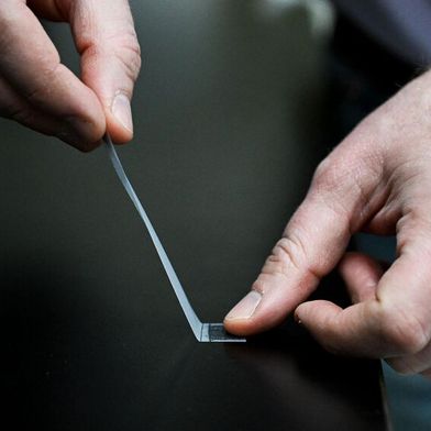 Penn State Associate Professor of Physics Nathan Keim demonstrates how ordinary adhesive tape can form “memories.”  (Source: Jaydyn Isiminger/ Penn State)