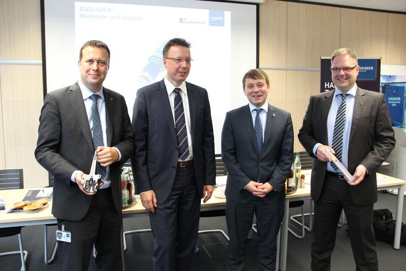 Oliver Sax, Haimer, Dr. Tilo Krieg, Kennametal, Andreas Haimer und Thilo Müller, Kennametal, (v. li.) stellten die Duo-Lock-Schnittstelle vor. (Bild: Kroh)