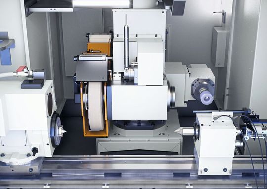 Arbeitsraum der Emag «UG»-Baureihe. Die Kombination aus schwenkbarer B-Achse und direktangetriebenen Spindeln ermöglicht das Innen- und Aussenschleifen.(Bild:  Emag)