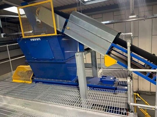 Ajax Equipment has supplied Binding Solutions with a feed system comprising buffer hopper, screw feeder and agitated screw feeder for a pilot plant handling iron ore and additives. (Source:  Ajax Equipment)