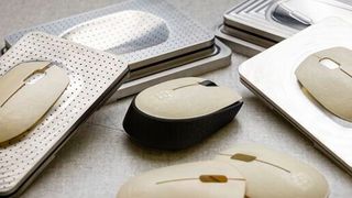 Empa scientist Thomas Geiger has produced housing parts for computer mice from cellulose fibers on a trial basis. The surfaces shine like precious ivory; the components are completely compostable. (Source: Empa)