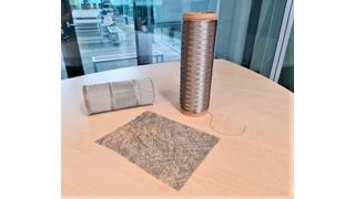 Das Produkt Alucoat ist ab Januar erhältlich! Aluminiumbeschichtete Glas- oder Basaltfasern als Multifilamentgarn, Gewebe und Vlies, die zur elektromagnetischen Abschirmung im Automobilbau dienen. (Amac / Fibrecoat)