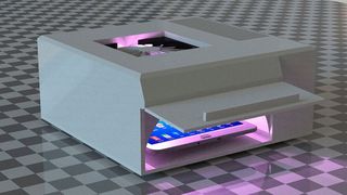 Ultraviolettes Licht desinfiziert Smartphones.  (Thomas Westerhoff/Fraunhofer IOSB-AST)