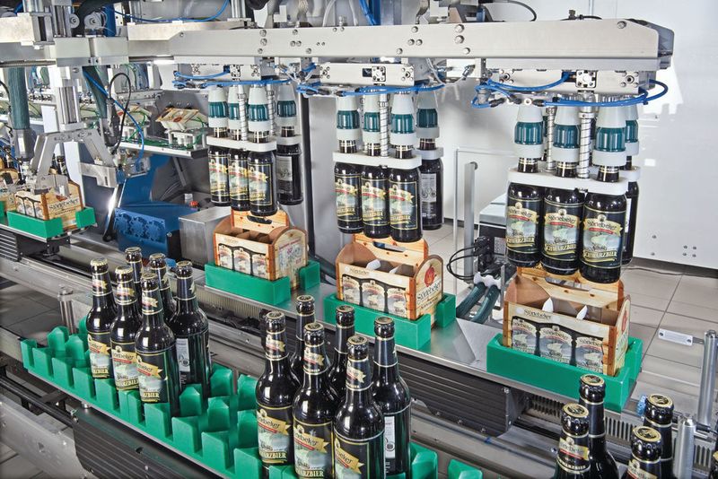 TLM-Transmodule sind einachsige, schienenbasierte Roboter, die sich durch Formatplatten auf das jeweilige Produkt anpassen lassen. (Schubert)