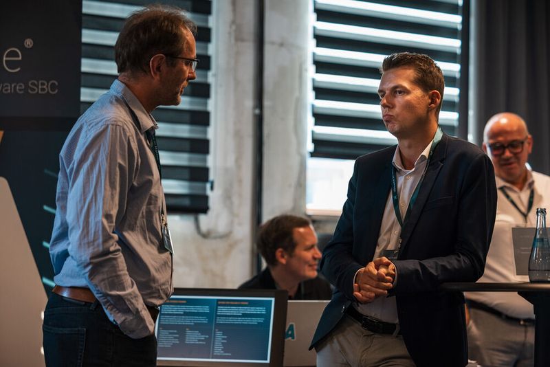 Peter Frimmel (Landratsamt Traunstein) und Michael Hanzl (Digicom) im Gespräch (Bild: C4B)