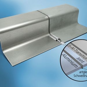 Ein Bimetallband aus den zu verbindenden Metallen – ein sogenannter Transition Joint – fungiert als Bindeglied zwischen den zu verbindenden Bauteilen.