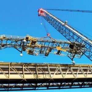 Fig. 1: New gantry structure encloses existing skyline gantry system.