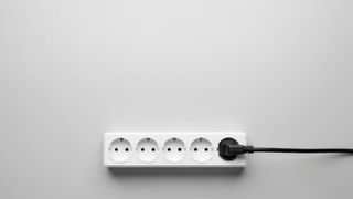 The article explains power strips and their role in solving outlet problems. (Source: © Dara - stock.adobe.com)
