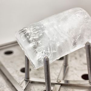 AWI scientist Julia Gütermann is preparing an Arctic sea-ice core for a microplastic analysis  in a lab at AWI Helgoland.