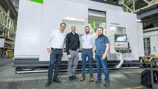 From left to right: Cornelius Kiesel, President of Zimmermann Inc., Brian Czapla, Sales Manager at Century Tool, Yousif Sallan, Project Manager at Zimmermann Inc. and Tom Bradford, Production Manager at Century Tool in front of the "FZU37" portal milling machine. (Image:Ivette Gersh Photography)