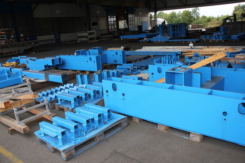 Bereits 1997 hat Kinkele Spiralrohrmaschinen gebaut. Alle blauen Konstruktionsteile sind von Kinkele. Der Auftragsfertiger wäre in der Lage binnen 6 Monate so eine komplette Anlage herzustellen, vorausgesetzt der Kunde hat bereits alles wie beispielsweise Zeichnungen soweit fertig. (Sonnenberg)
