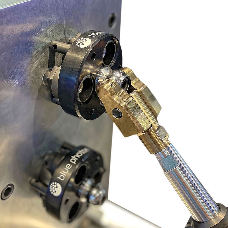 The Blue Photon Workholding Stabilizer System being used with third-party stabiliser equipment for adding extra rigidity to tall components while they are being machined.