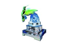 Bild 1: Werden Werkstücke bei der Teilereinigung in Vibration versetzt, kommt es zu einem Reinigungseffekt. Die gelöste Verschmutzung wird von Düsen abgesaugt. (Archiv: Vogel Business Media)