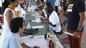 Senior study author Dr. Namratha Kandula (left) sharing information on salt and diet during a community medicine event.  (Source: Northwestern University)