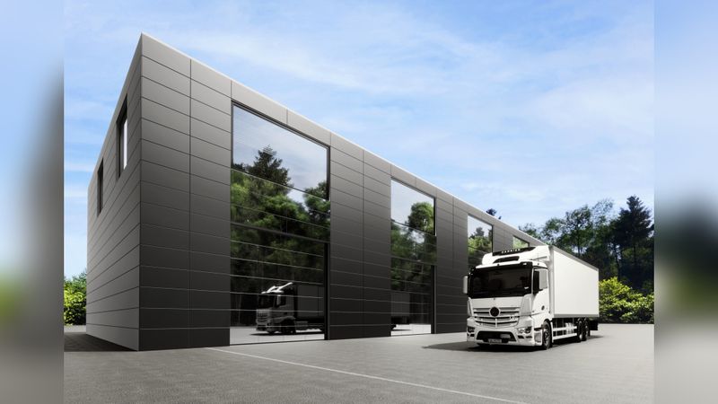 Hörmann Aluminium-Sektionaltor ALR F42 Vitraplan AT mit vorgesetzten Alu-cobond-Fassadenplatten, hier in der Ausführung naturAL Reflect 405.(Bild:  Hörmann)