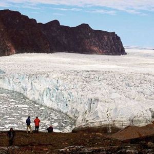The calving front of Bowdoin Glacier in northwestern Greenland, where icebergs are discharged and ice under the water melts. 