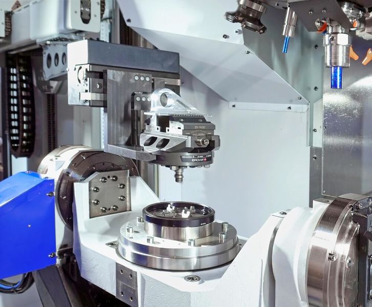 A pallet carrying a machined component being returned automatically from the Brother Speedio U500Xd2-100T to one of the 30 positions in the Erowa Robot Compact 80 storage system. (Source: Whitehouse Machine Tools )