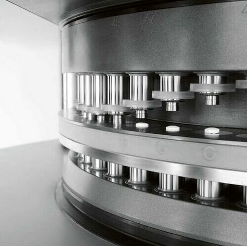 Ima's Prexima 800 tablet press is a double-side type equipped with a Euro-D turret, hosting 53 stations with Euro-D bevelled-edge round tablet of Ø 13 mm diameter. Ima's Prexima 800 tablet press is a double-side type equipped with a Euro-D turret, hosting 53 stations with Euro-D bevelled-edge round tablet of Ø 13 mm diameter.
