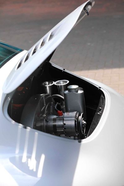 This is complemented by a specially crafted air-cooled 2332 cc boxer engine, based on an original 356 casing, offered in the 