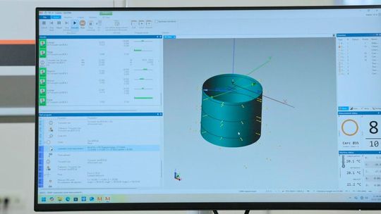 The dimension inspection process for the workpiece reference. The measurement software interface is displayed on the system monitor, which includes a 3D model of the measured surface of the part and the parameters of the inspection program.(Source:  Mitutoyo Europe)