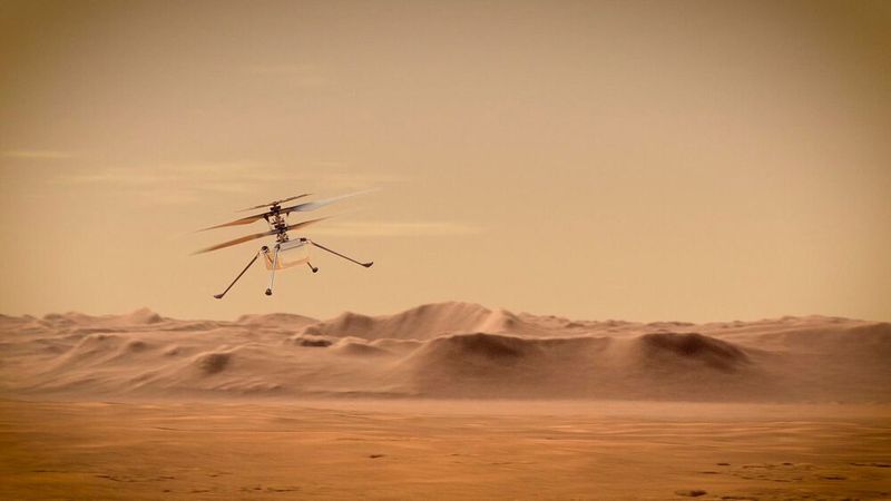 Erstmals in der Geschichte der Raumfahrt wird ein von der Erde mitgeführtes Fluggerät vom Boden eines anderen Planeten in die Atmosphäre aufsteigen, kontrolliert die Gegend überfliegen und auch wieder landen, um das Experiment mehrere Male zu wiederholen. Bei weniger als einem Hundertstel des irdischen Luftdrucks musste Ingenuity extrem leicht gebaut werden und gleichzeitig sehr großflächige, extrem schnell rotierende Rotorblätter erhalten.  (NASA/JPL-Catech)