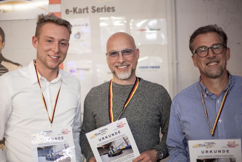 Das Siegertrio des e-Kart-Rennens am Abend (Gollin)