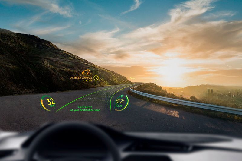 Das 2012 gegründete Start-up WayRay (www.wayray.com) aus Lausanne vertreibt ein Nachrüst-Kit für AR-Navigationssysteme. Dabei sollen dem Fahrer relevante Informationen in der Windschutzscheibe angezeigt werden. Für mehr Sicherheit beim Autofahren ist eine Anbindung des Smartphones und intuitive Bedienung mit Stimm- und Gestensteuerung möglich.  (WayRay)