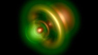 Nachdem ein Lichtteilchen ein Elektron aus einem Heliumatom entfernt hat, kann die Aufenthaltswahrscheinlichkeit des verbliebenen Elektrons berechnet werden. Je heller die Bereiche im Bild dargestellt sind, desto wahrscheinlicher ist sein Aufenthaltsort rund um den hier nicht sichtbaren Atomkern. (Schultze (MPQ) / Ossiander (LMU))