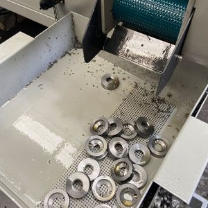 Components captured in the Hanwha XD38II after machining.(Source:  Dugard)