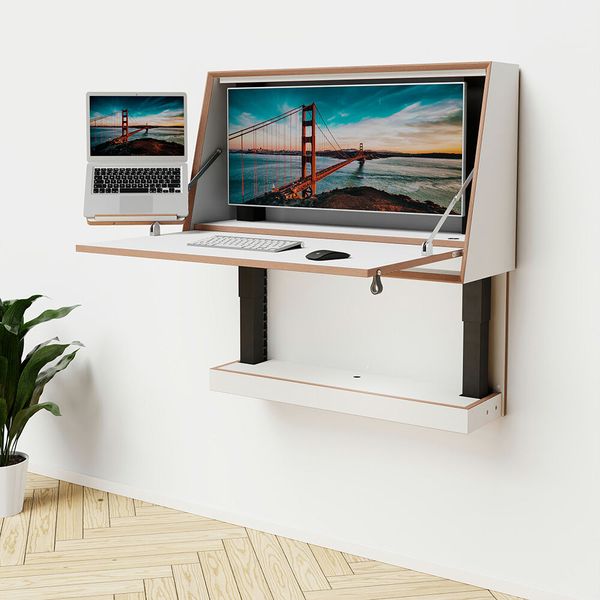 Wall-Ti ist ein elektrisch höhenverstellbarer, klappbarer Wandschreibtisch. In Deutschland aus zertifiziertem Birkenholz handgefertigt, benötigt er im geschlossenen Zustand je nach Modell lediglich 0,29 bis 0,36m² Fläche und bietet Platz für einen 34