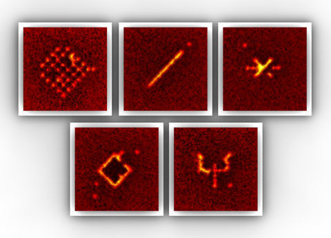 Abb. 2: Mit dem Adressierschema lassen sich beliebige Muster von Atomen im Gitter präparieren. Die atomaren Muster bestehen aus jeweils 10-30 einzelnen Atomen, die in einem künstlichen Kristall aus Licht gefangen sind.  (Bild: MPQ)