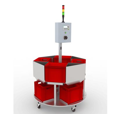 Karussell-Depotstation AUA 202 zur Teilepufferung. Die Anlage benötigt nur wenig Raum und bevorratet Material in acht Behältern. (Bild: MFT Technik)