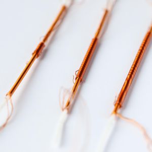 The component, consisting of two nested fibers wrapped with electrodes, generates enough force to power soft robots.(Source:  EPFL)