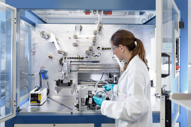 Scientist making lithium-ion battery samples in a research facility. (Arkema)