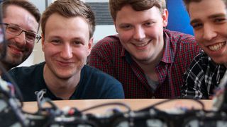 „Ourobot Team“ (v.l.): Die Ingenieurinformatik-Studenten der FH Bielefeld Matthäus Wiltzok, Johann Schröder, Adrian Gucze und Simon Beyer haben Ourobot entwickelt. (FH Bielefeld)