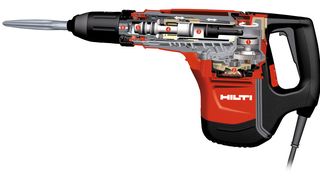 Elektro-pneumatisches Schlagwerk: Der Exzenter (1) setzt die Rotationsbewegung des Elektromotors (2) über ein Luftpolster (3) in eine Hubbewegung des Flugkolbens (4) um. Dieser fliegt mit grosser Geschwindigkeit auf den Schlagbolzen (5), welcher die Energie auf das Werkzeug (6) überträgt. (Bild: Hilti)