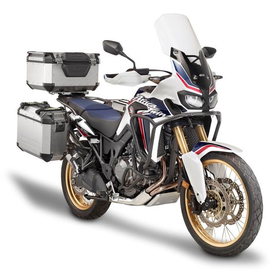 Reisefertig: Die Africa Twin von Honda wurde mit Koffern und Bügeln von Givi ausgestattet. Reisefertig: Die Africa Twin von Honda wurde mit Koffern und Bügeln von Givi ausgestattet.
