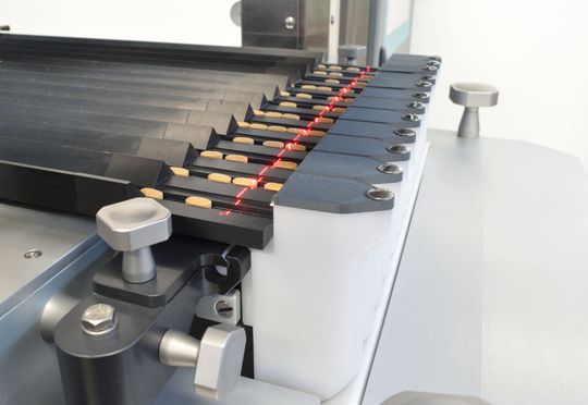 The pre-feeder handles about 3 thousand tablets a minute and utilises the new Valida technology developed in-house to verify the integrity of each tablet with feasible reject before feeding it into the blister. The pre-feeder handles about 3 thousand tablets a minute and utilises the new Valida technology developed in-house to verify the integrity of each tablet with feasible reject before feeding it into the blister.