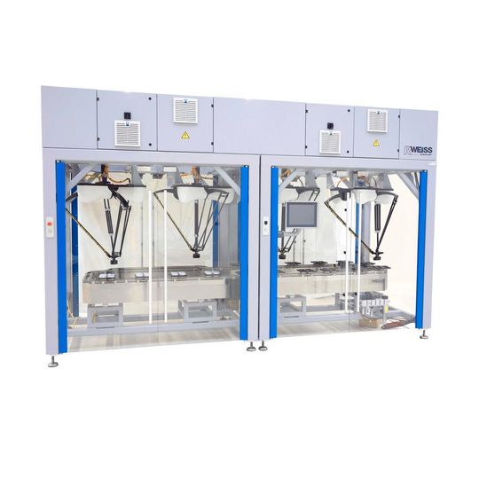 Unirob Toploading Maschine mit integriertem Intelligent Shuttle System (ISS) Unirob Toploading Maschine mit integriertem Intelligent Shuttle System (ISS)