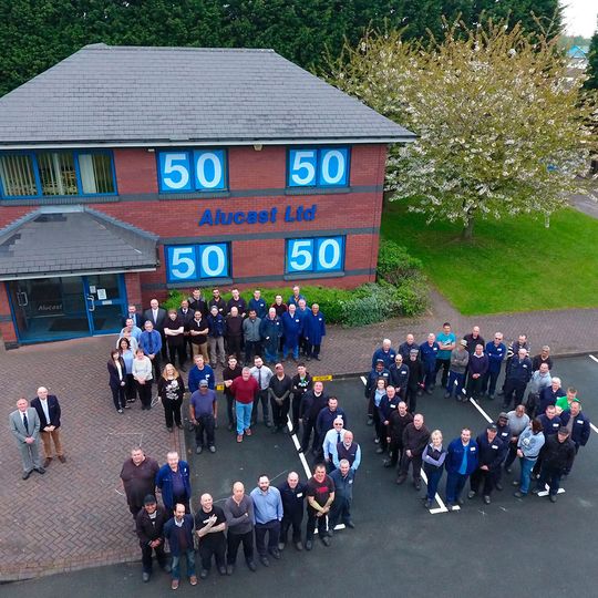 Members of staff celebrate 50 years in business for Alucast. Members of staff celebrate 50 years in business for Alucast.
