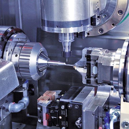 The working area of the seven-axis Bumotec s191 linear CNC turn-mill centre installed at the AMRC with Boeing Centre. The working area of the seven-axis Bumotec s191 linear CNC turn-mill centre installed at the AMRC with Boeing Centre.
