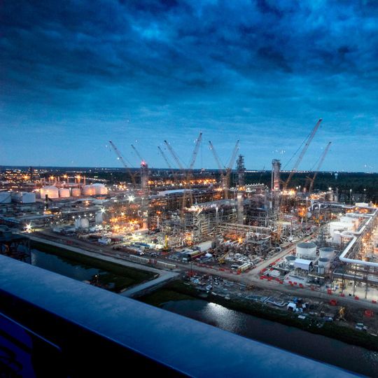 Night view of Chevron Phillips Chemical Company's U.S. Gulf Coast Petrochemicals Project in Baytown, Texas. Night view of Chevron Phillips Chemical Company's U.S. Gulf Coast Petrochemicals Project in Baytown, Texas.