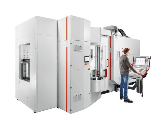 Zu sehen ist das an ein 5-Achs-Bearbeitungszentrum C 42 U adaptierte Handlingsystem HS flex. Zu sehen ist das an ein 5-Achs-Bearbeitungszentrum C 42 U adaptierte Handlingsystem HS flex.