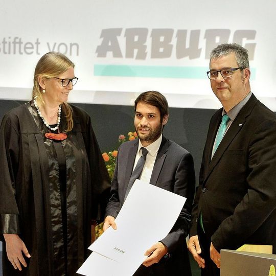 Dr Andreas Schmideder (centre) won the award for best dissertation, presented by award coordinator Professor Birgit Vogel-Heuser and Michael Vieth, Arburg's apprenticeship manager. Dr Andreas Schmideder (centre) won the award for best dissertation, presented by award coordinator Professor Birgit Vogel-Heuser and Michael Vieth, Arburg's apprenticeship manager.